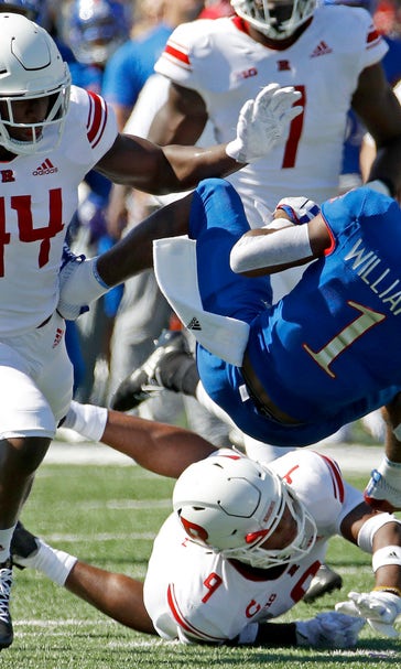 Takeaways, run game lead Kansas to 55-14 blowout of Rutgers